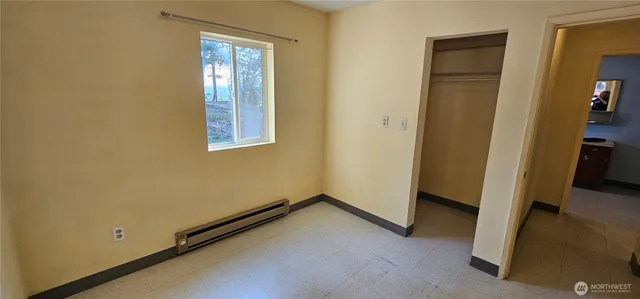 a bathroom with a toilet and a sink