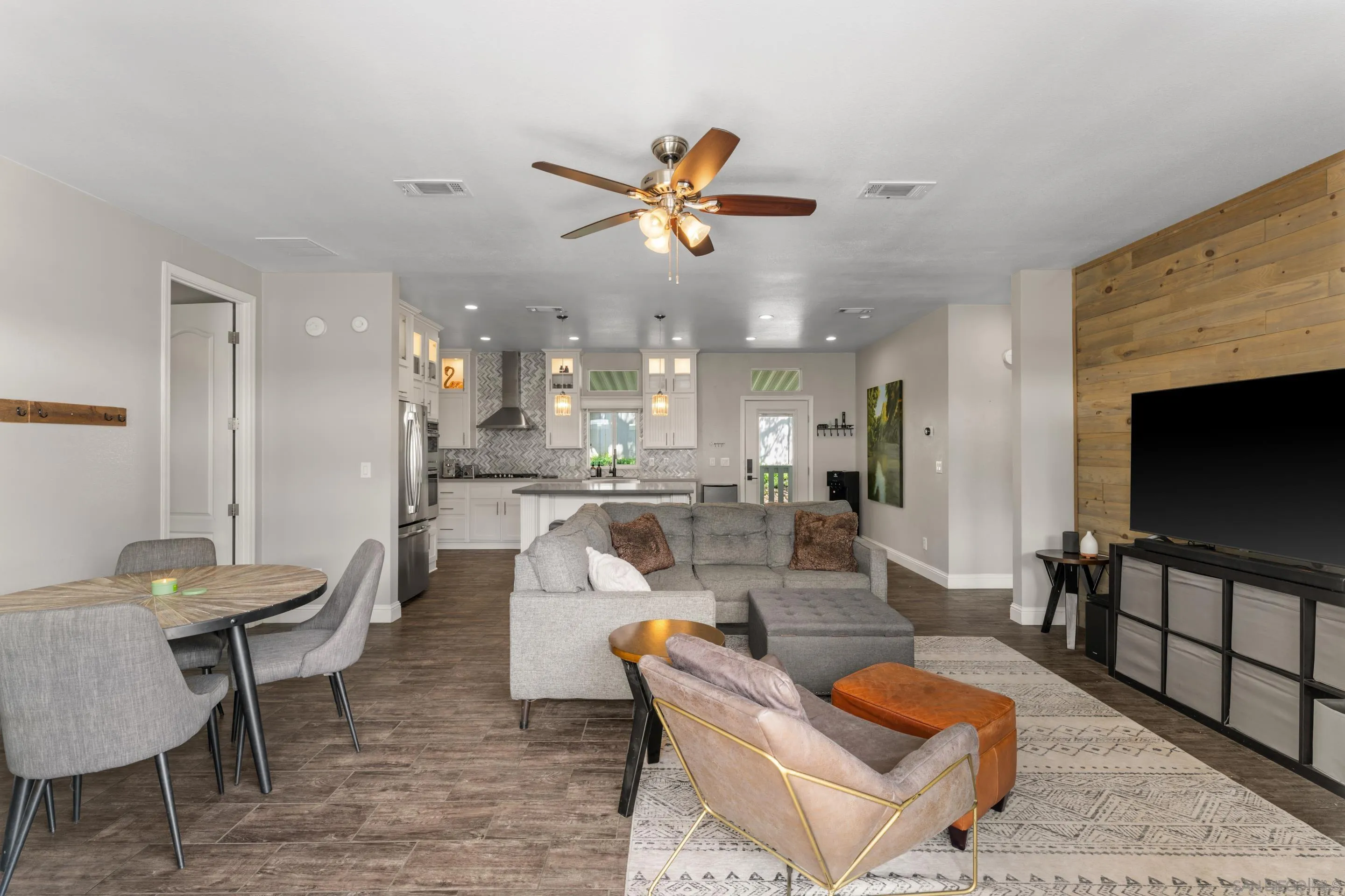 3505 Alpine Boulevard, Unit 1 Alpine, CA 91901 - Photo 14 of 27 a living room with furniture and a flat screen tv