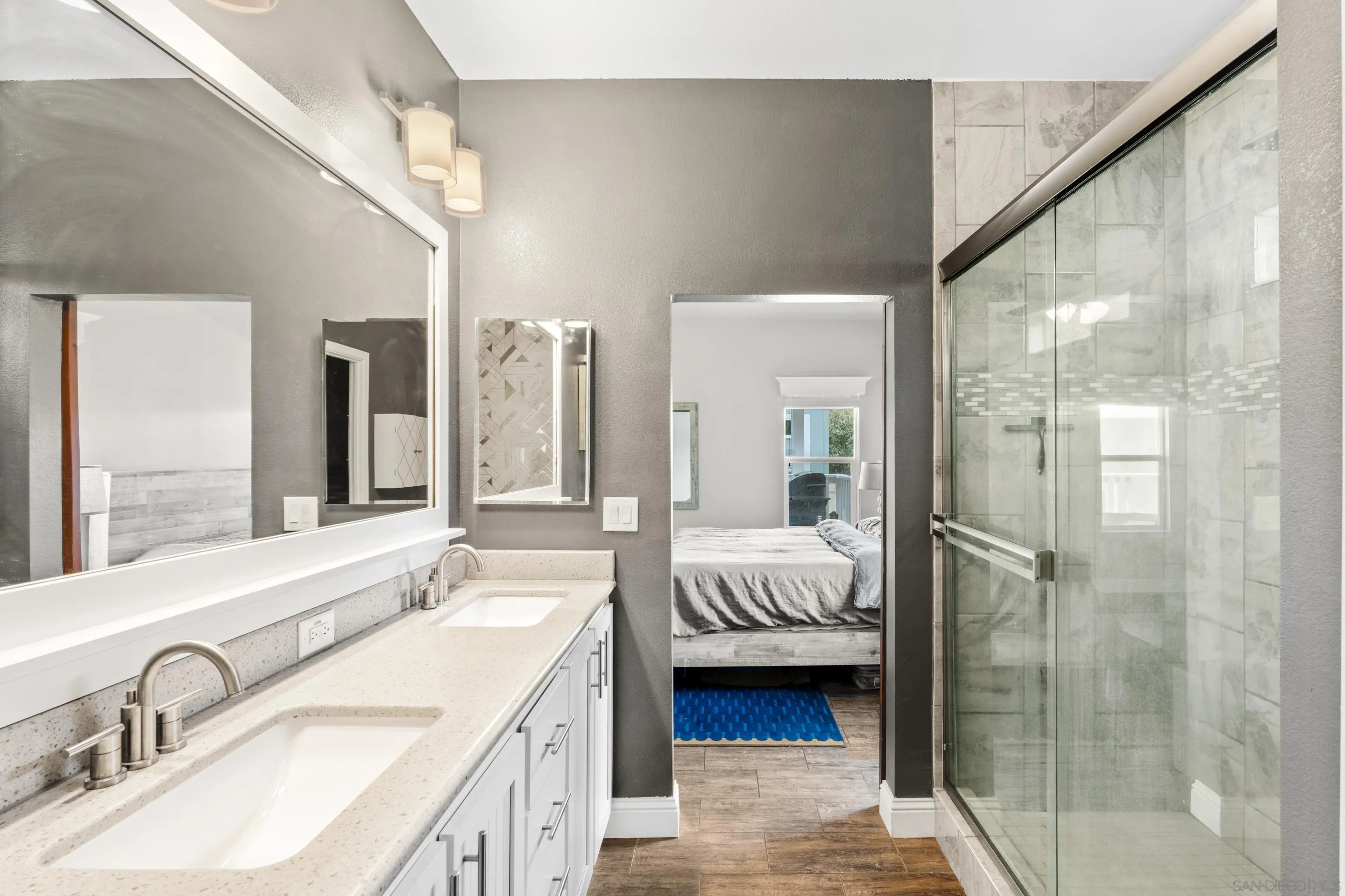 3505 Alpine Boulevard, Unit 1 Alpine, CA 91901 - Photo 21 of 27 a bathroom with a double vanity sink mirror and shower