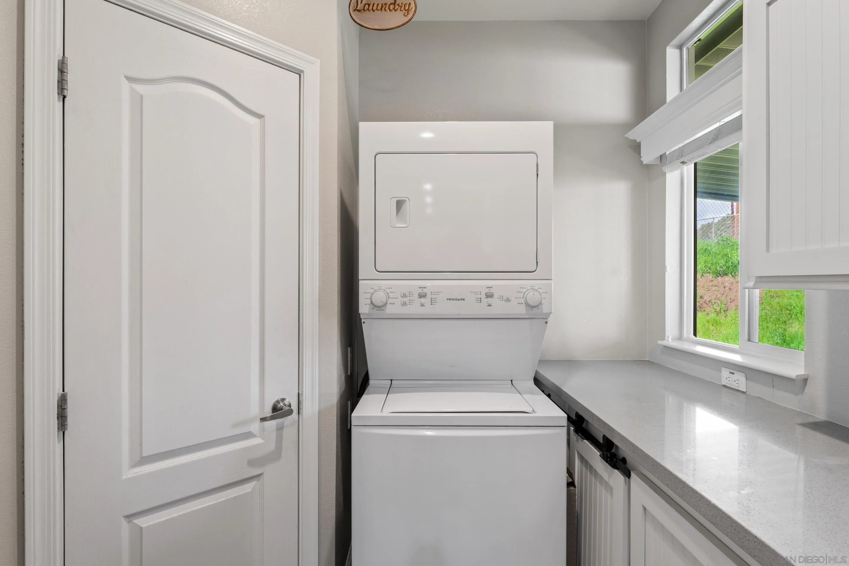 3505 Alpine Boulevard, Unit 1 Alpine, CA 91901 - Photo 24 of 27 a utility room with dryer and washer