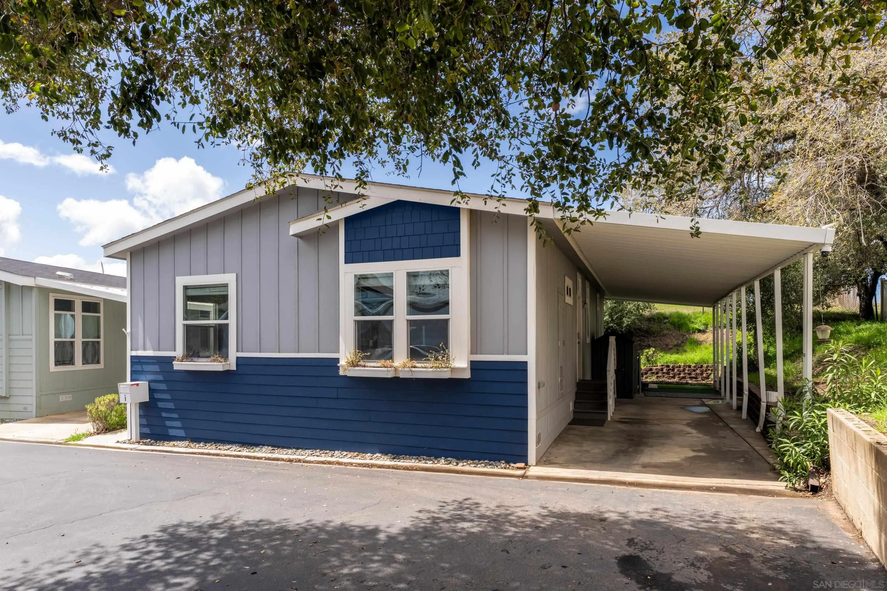 3505 Alpine Boulevard, Unit 1 Alpine, CA 91901 - Photo 25 of 27 a front view of a house with a yard