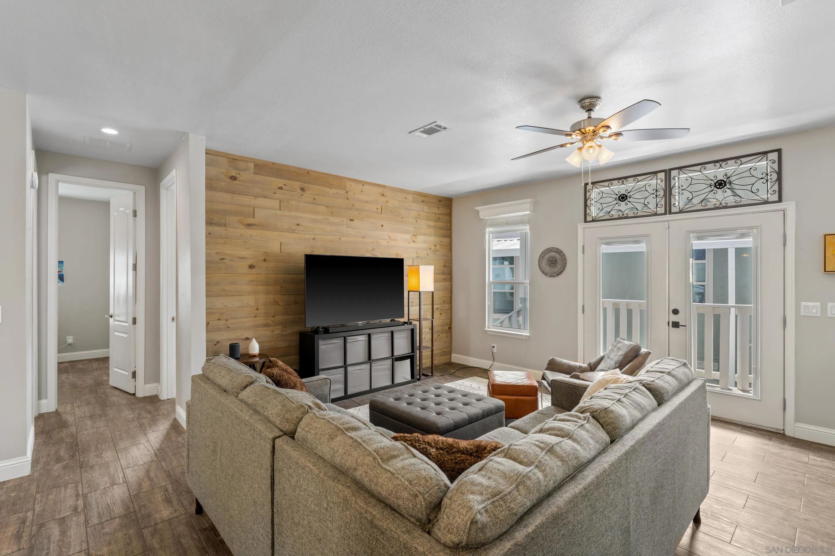 3505 Alpine Boulevard, Unit 1 Alpine, CA 91901 - Photo 4 of 27 a living room with furniture and a flat screen tv