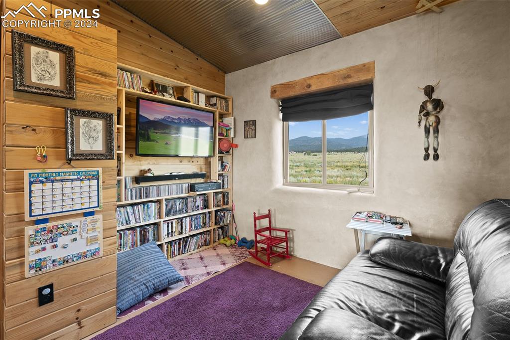 54309 County Rd LL56 Villa Grove, CO 81155 - Photo 23 of 43 a living room with furniture and a flat screen tv