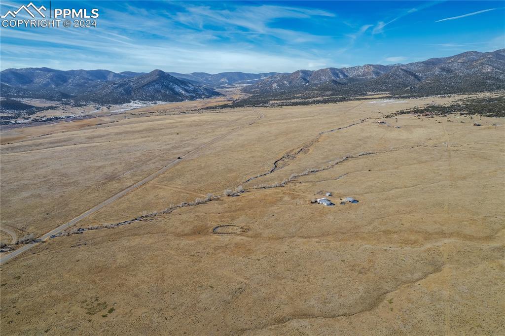 54309 County Rd LL56 Villa Grove, CO 81155 - Photo 35 of 43 a view of an ocean beach and mountain