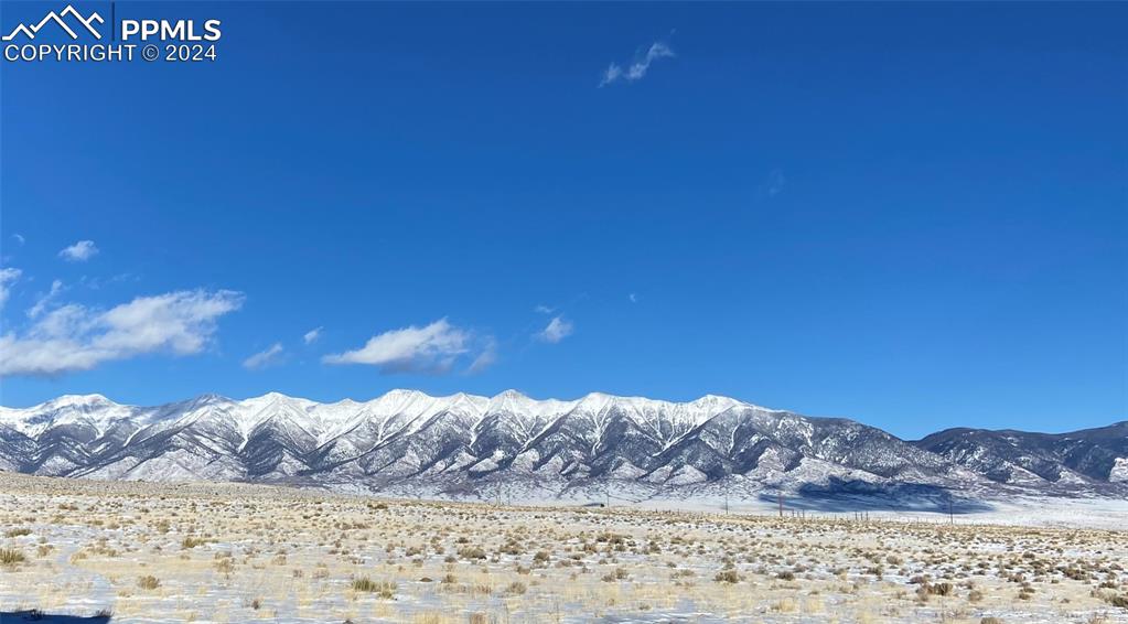 54309 County Rd LL56 Villa Grove, CO 81155 - Photo 41 of 43 a view of a large body of water with a house in background