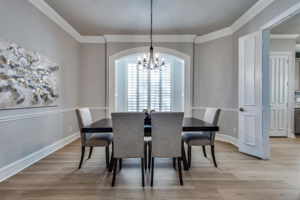 3512 Provine Road McKinney, TX 75072 - Photo 11 of 33 a view of a dining room with furniture window and wooden floor