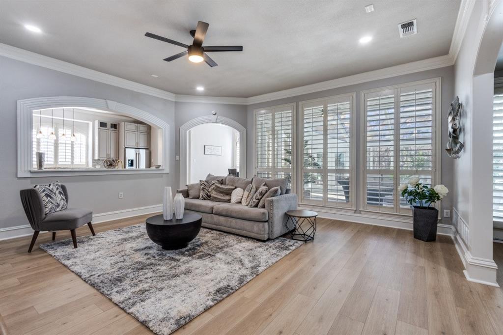 3512 Provine Road McKinney, TX 75072 - Photo 18 of 33 a living room with furniture potted plant and a large window