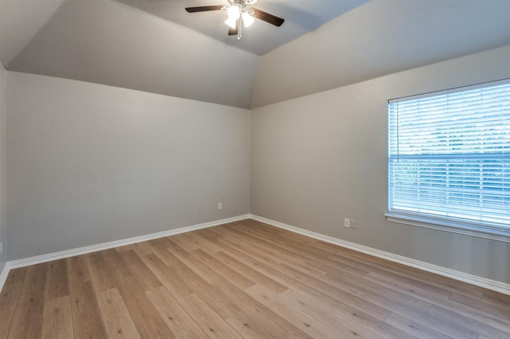 3512 Provine Road McKinney, TX 75072 - Photo 30 of 33 wooden floor in an empty room with a window