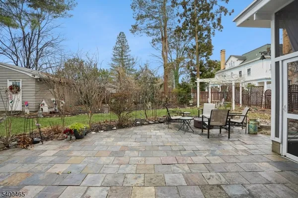 a view of a bench in a backyard