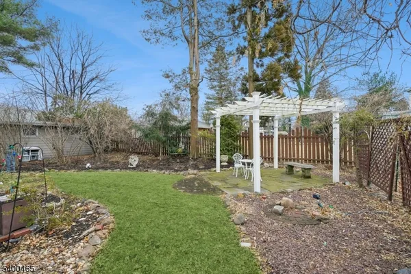 a view of a house with backyard