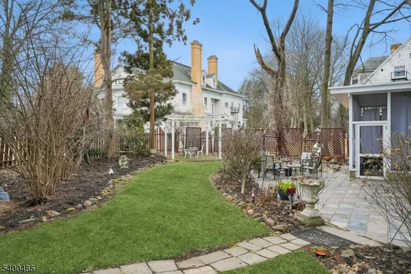 a view of yard with patio