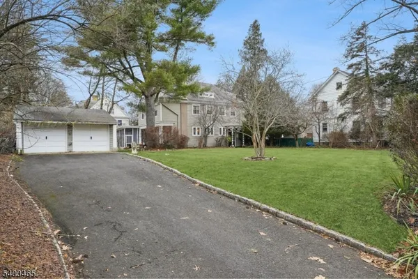 a house with garden in front of it