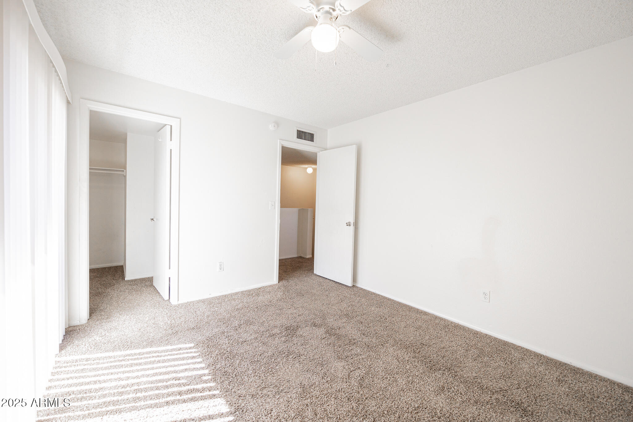 2802 North 43rd Avenue, Unit B Phoenix, AZ 85009 - Photo 11 of 18 an empty room with a bathroom