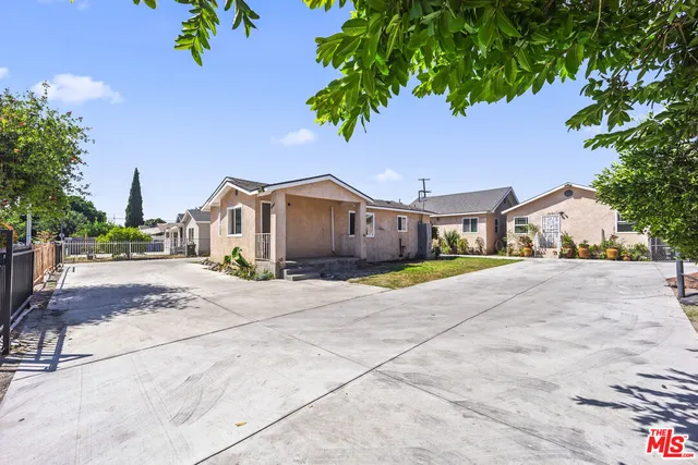 a house with yard in front of it