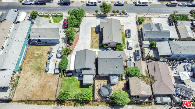 an aerial view of a house with outdoor space