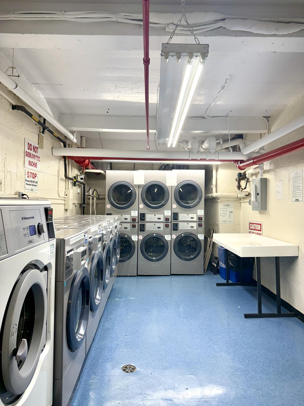 241 East 76th Street, Unit 5J Manhattan, NY 10021 - Photo 11 of 11 Laundry Room