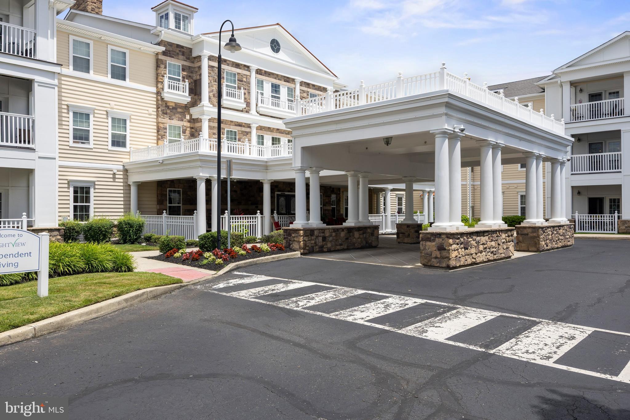 170 East Greentree Road, Unit 2232 Marlton, NJ 08053 - Photo 2 of 41 front view of a building with a yard