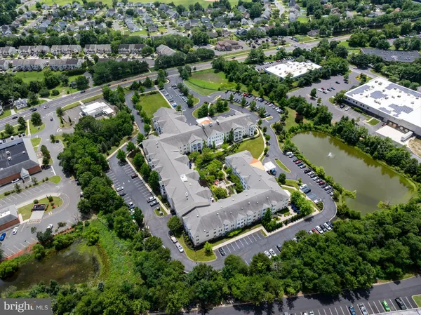 an aerial view of a city and lake view