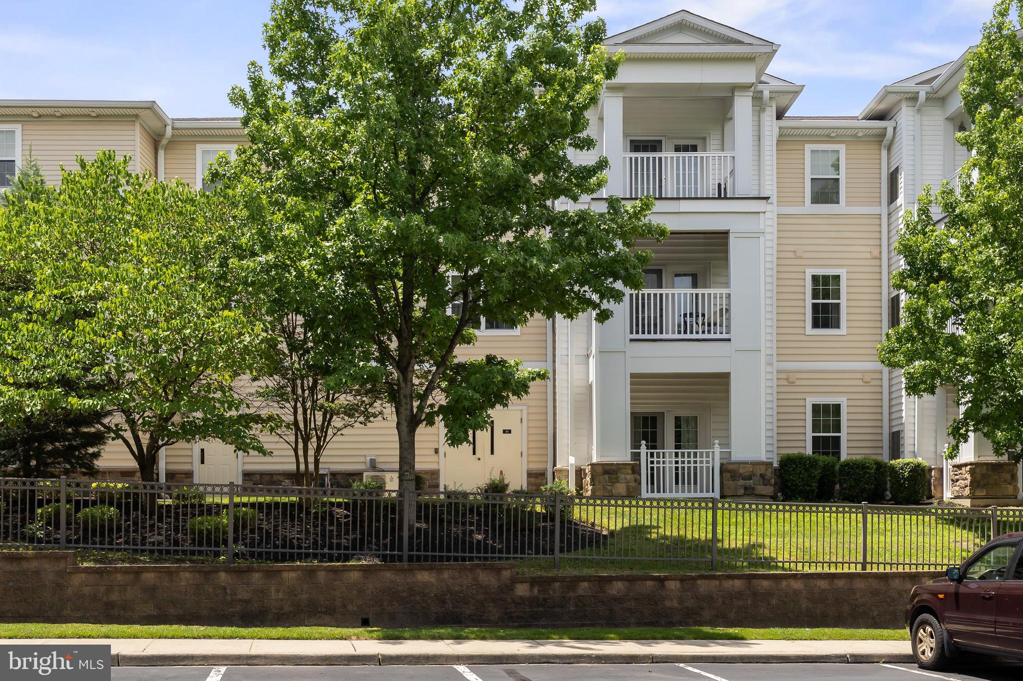 170 East Greentree Road, Unit 2232 Marlton, NJ 08053 - Photo 6 of 41 a view of a house with a yard
