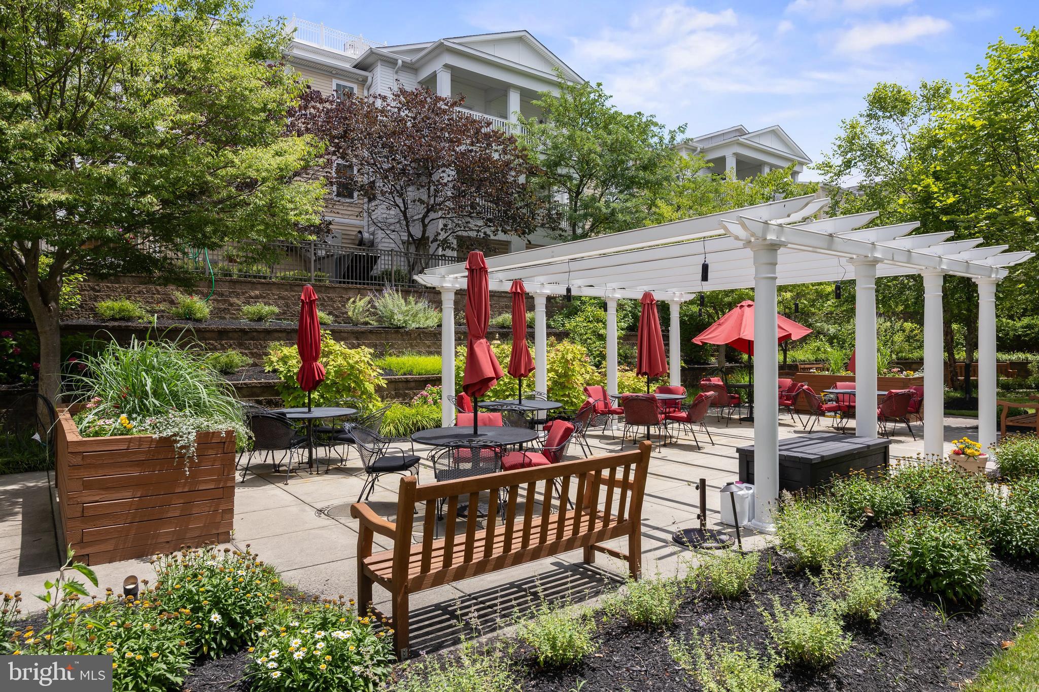 170 East Greentree Road, Unit 2232 Marlton, NJ 08053 - Photo 7 of 41 a view of a patio with couches table and chairs and potted plants