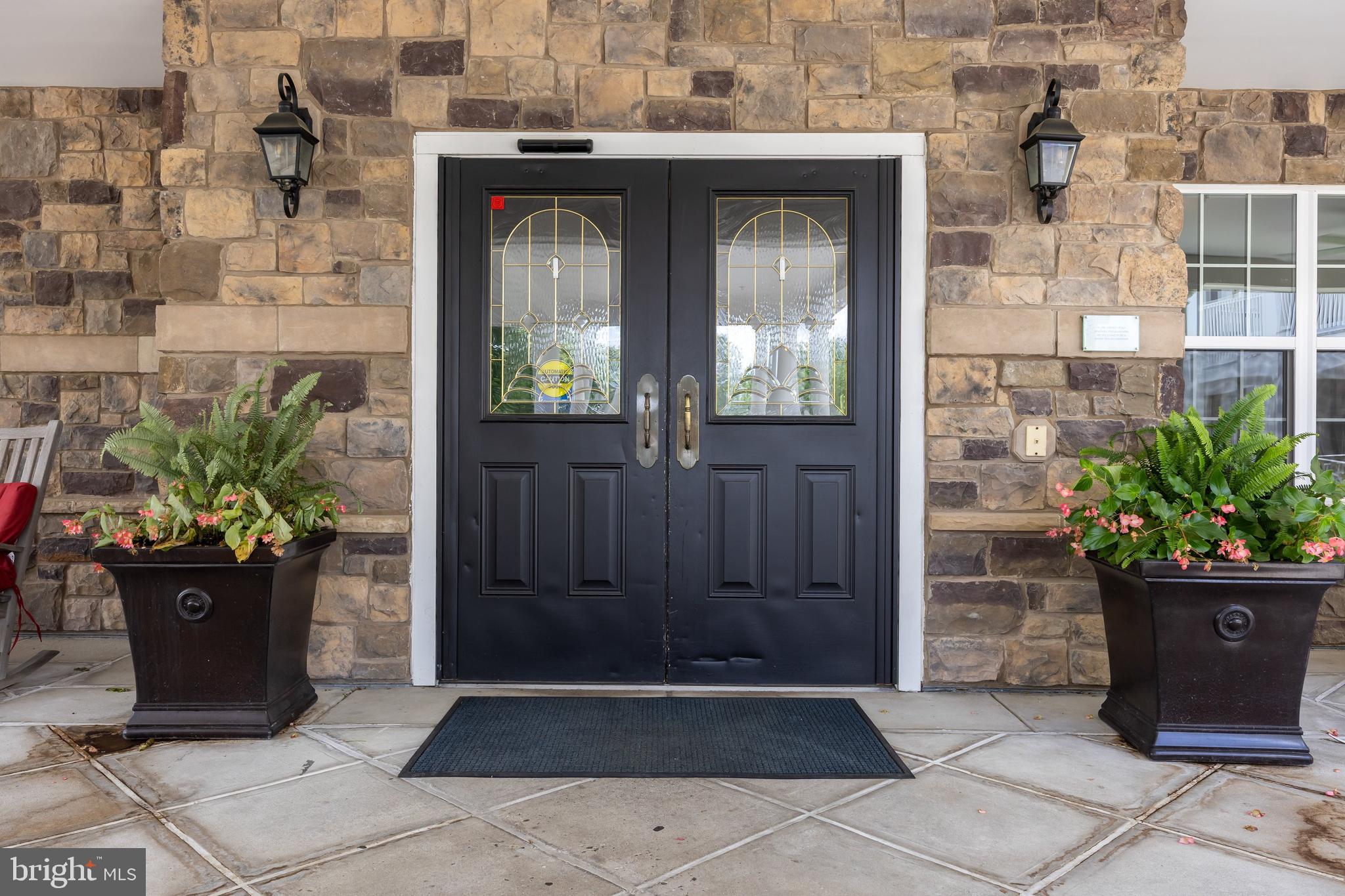 170 East Greentree Road, Unit 2232 Marlton, NJ 08053 - Photo 8 of 41 a front view of a house with potted plants