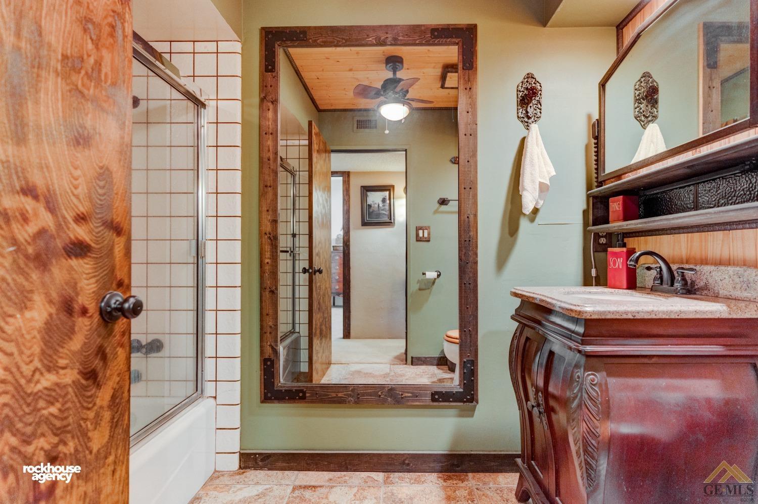 Undisclosed Address Bakersfield, CA 93308 - Photo 13 of 22 a view of a entryway door of the house