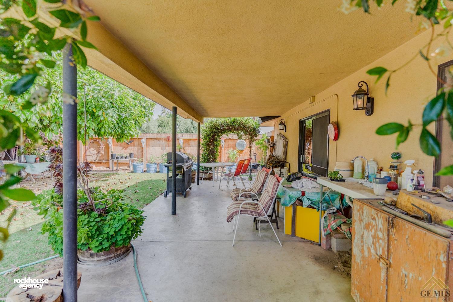Undisclosed Address Bakersfield, CA 93308 - Photo 20 of 22 a view of swimming pool with outdoor seating and plants