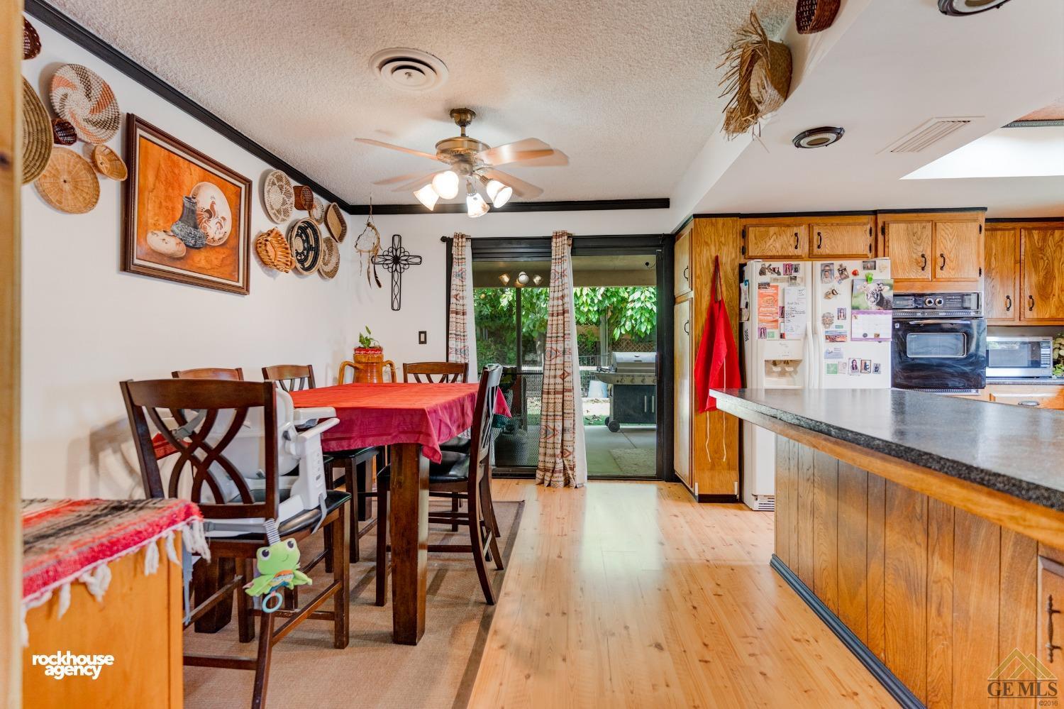 Undisclosed Address Bakersfield, CA 93308 - Photo 7 of 22 a very nice looking dining room with furniture and a large window