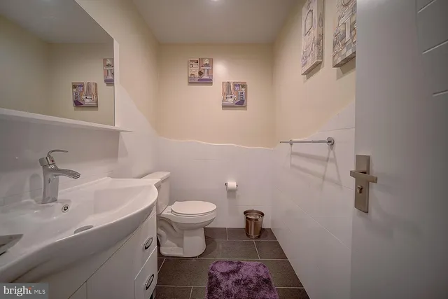 a bathroom with a sink and a toilet