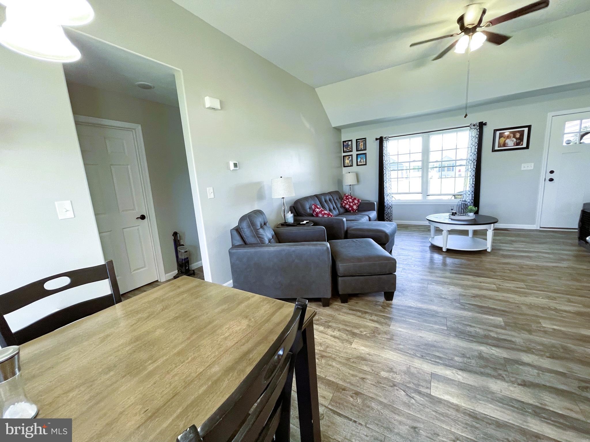 29389 Eagle Point Drive Seaford, DE 19973 - Photo 17 of 42 a living room with furniture and window