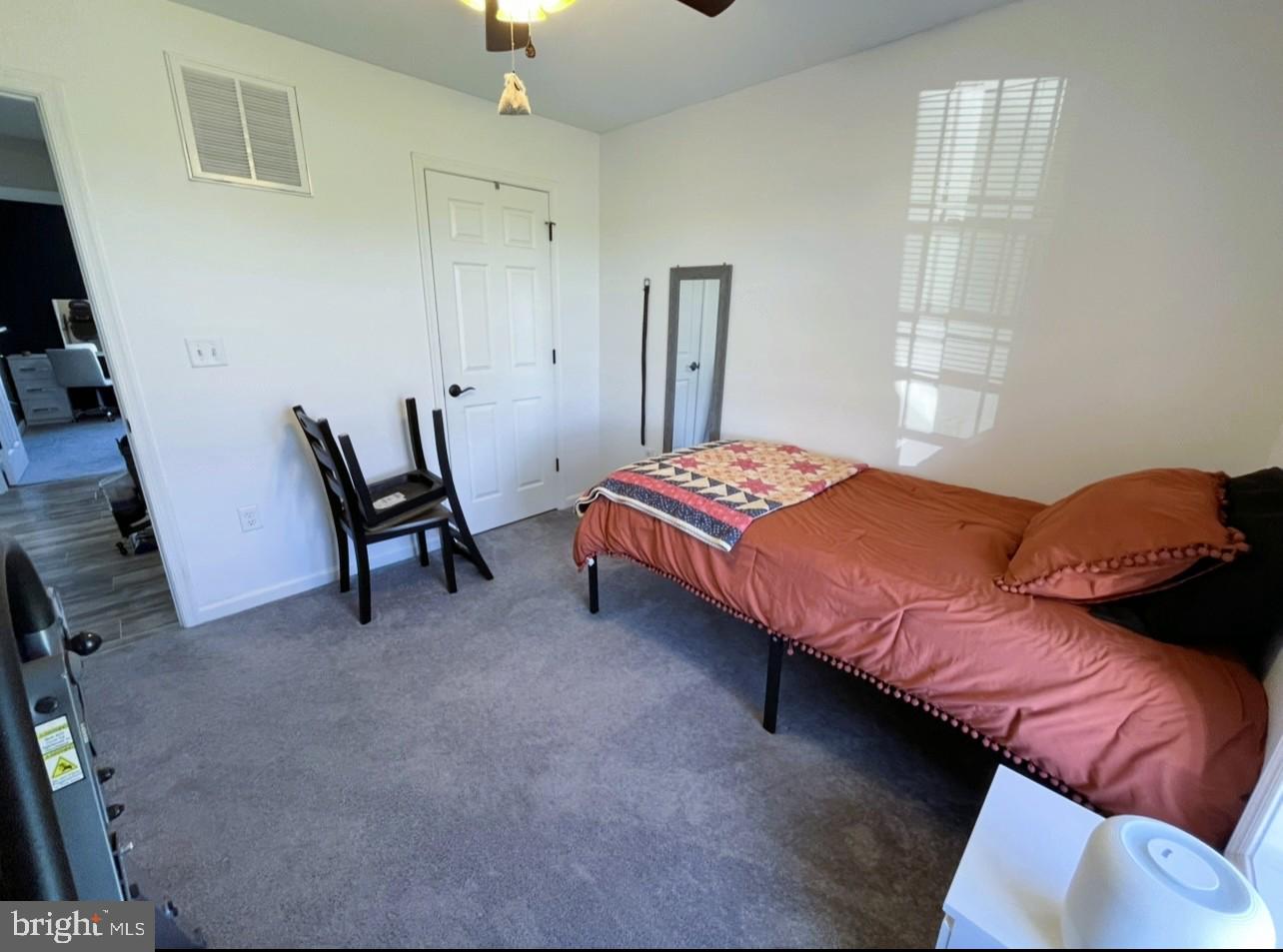 29389 Eagle Point Drive Seaford, DE 19973 - Photo 38 of 42 a bedroom with a bed and a window