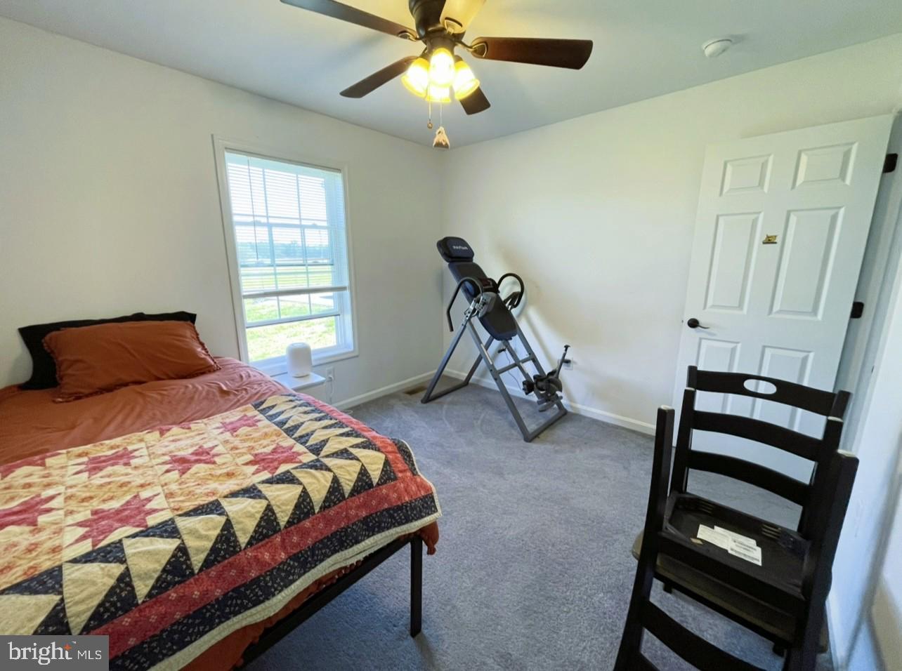 29389 Eagle Point Drive Seaford, DE 19973 - Photo 39 of 42 a bedroom with bed and a window