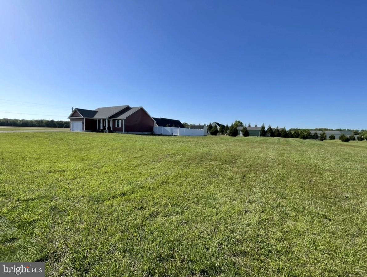 29389 Eagle Point Drive Seaford, DE 19973 - Photo 4 of 42 a view of a lake and a yard