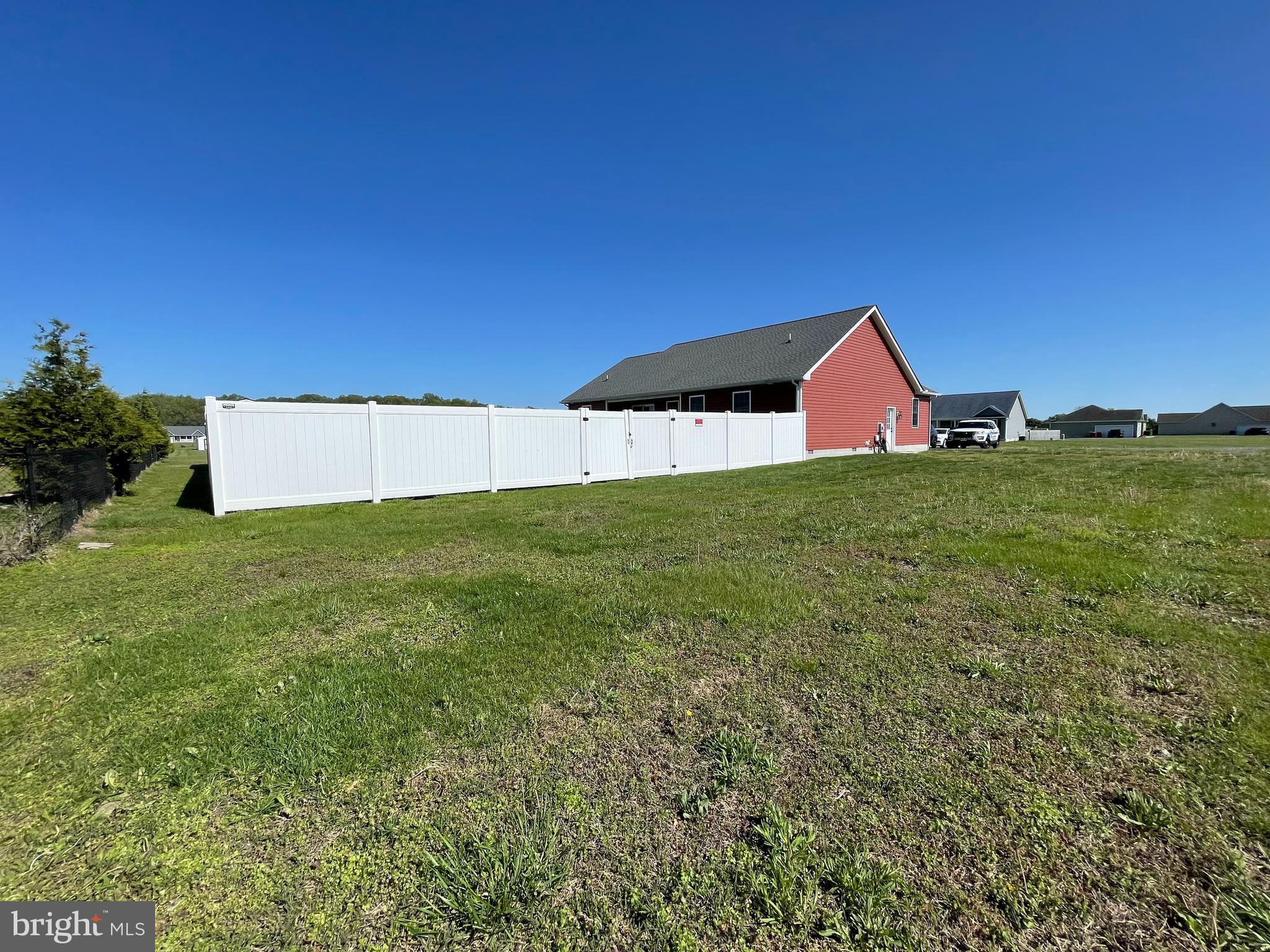 29389 Eagle Point Drive Seaford, DE 19973 - Photo 5 of 42 a view of a house with a yard