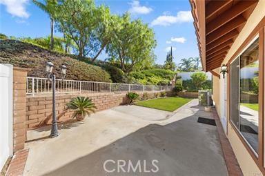 1611 San Almada Road Corona, CA 92882 - Photo 7 of 9 a view of a backyard with sitting area