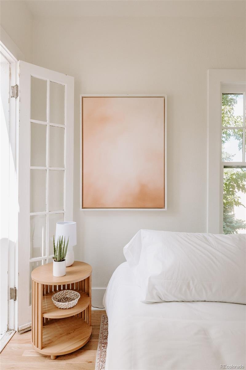 836 9th Street Boulder, CO 80302 - Photo 15 of 32 a bedroom with a bed and a window