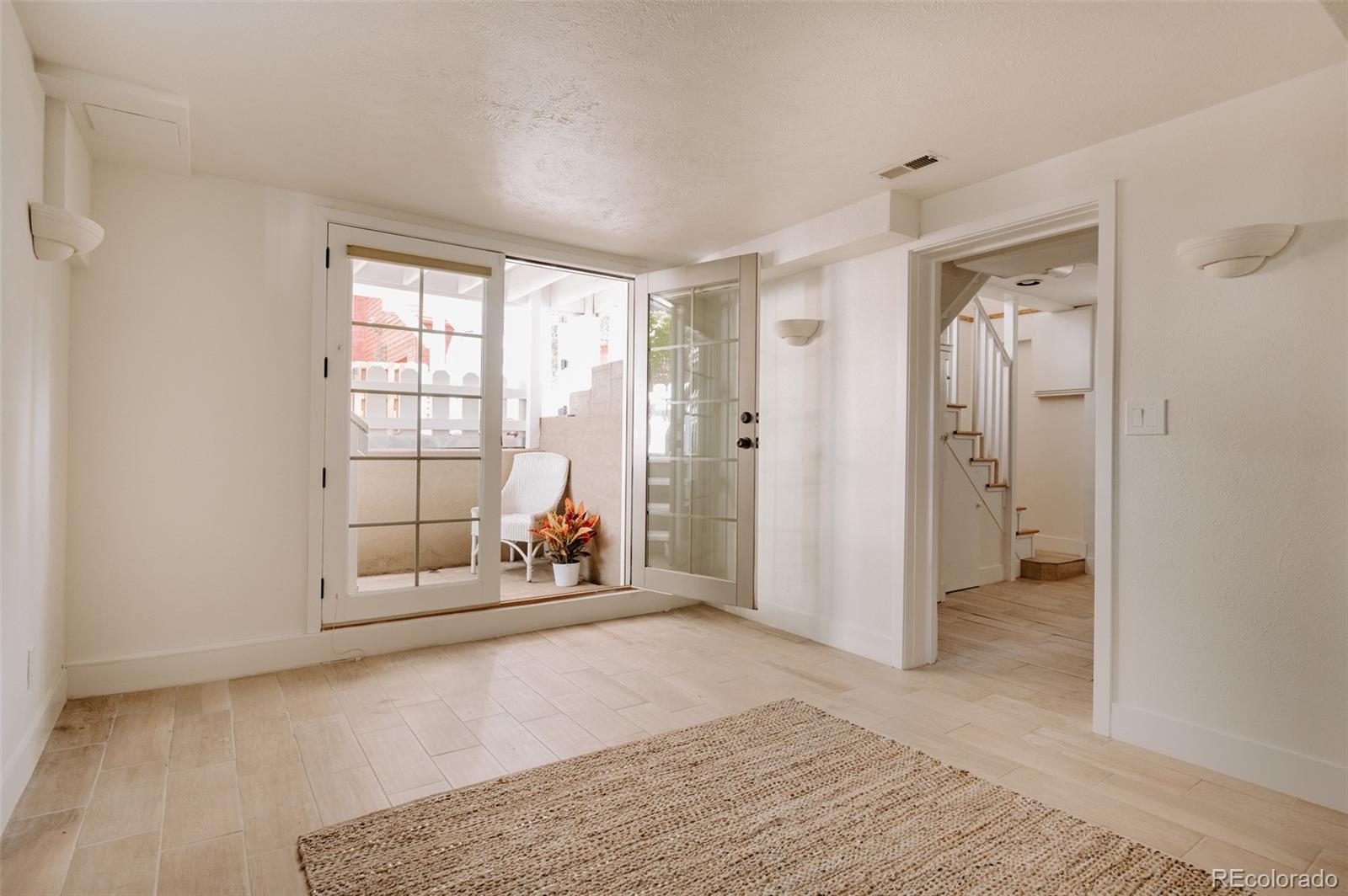 836 9th Street Boulder, CO 80302 - Photo 23 of 32 wooden floor and window in a room