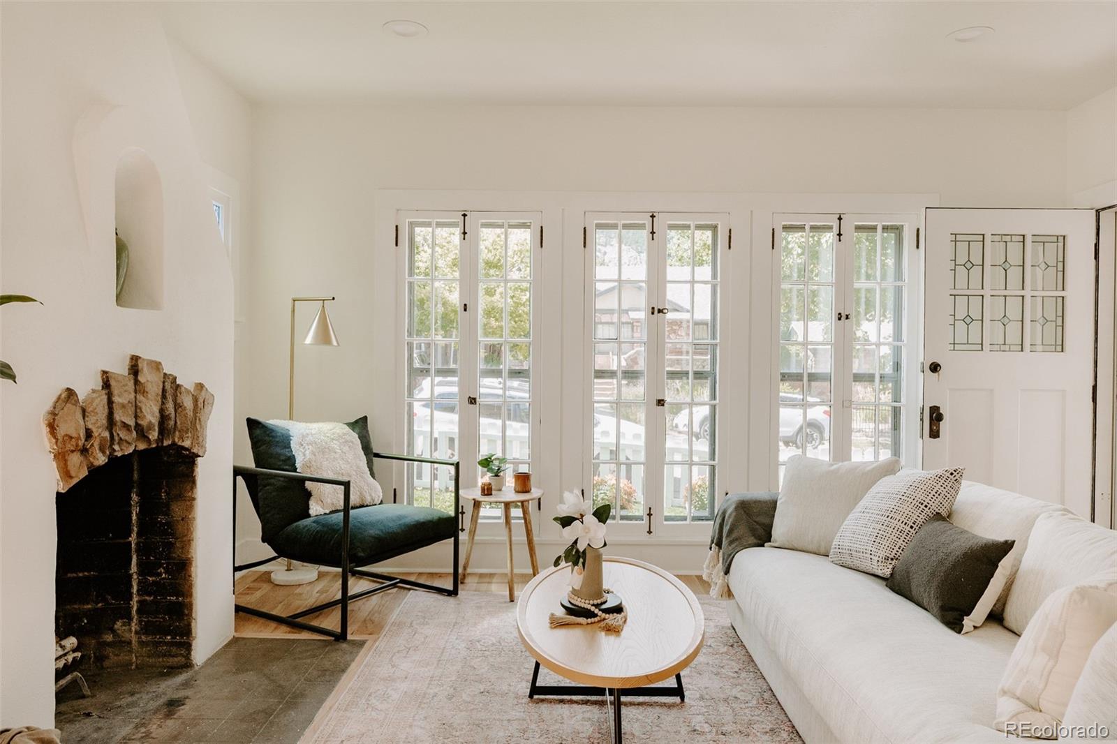836 9th Street Boulder, CO 80302 - Photo 4 of 32 a living room with furniture and a large window