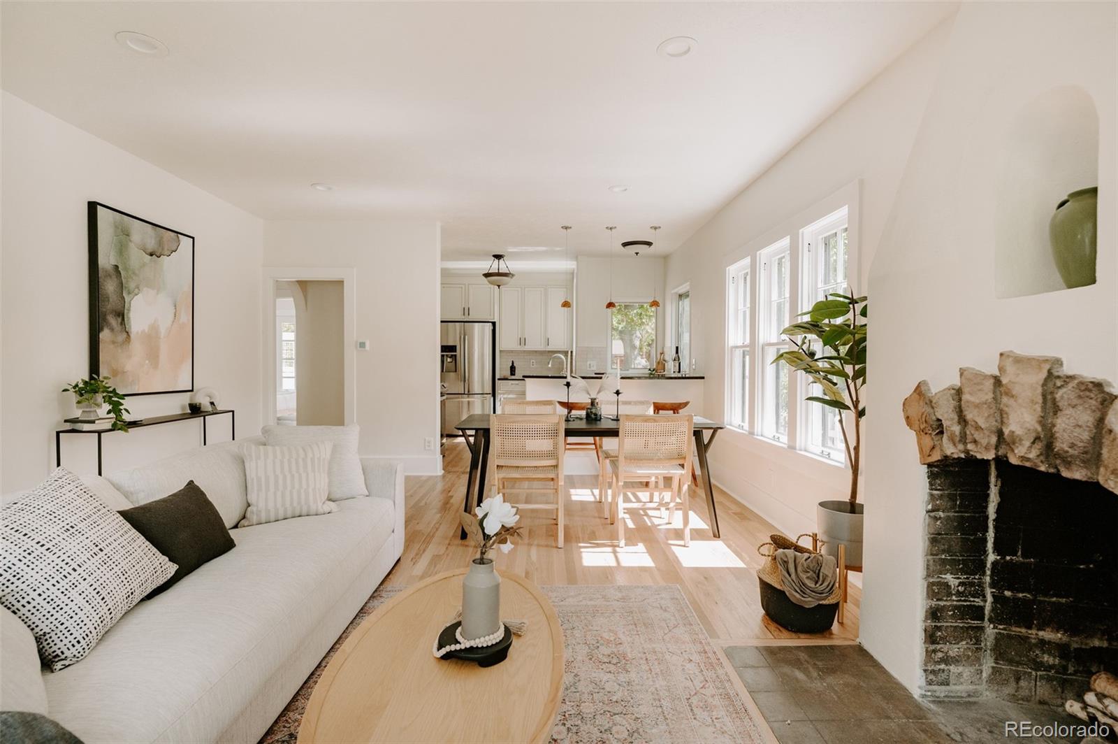 836 9th Street Boulder, CO 80302 - Photo 6 of 32 a living room with furniture and a fireplace