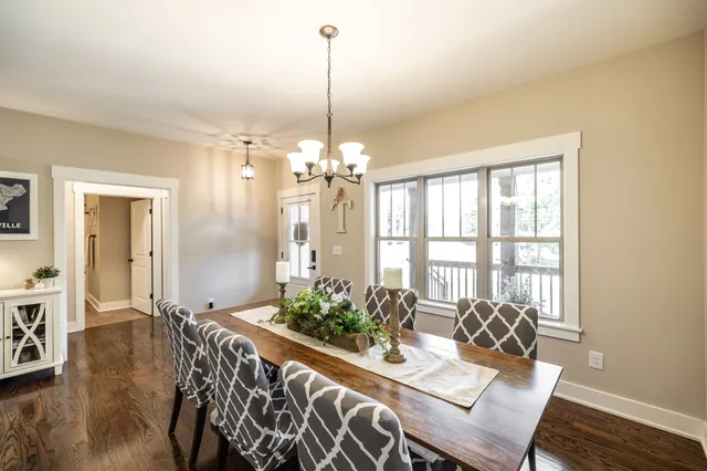 a kitchen with lots of counter top space and stainless steel appliances