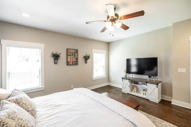 a bathroom with a sink vanity and a mirror