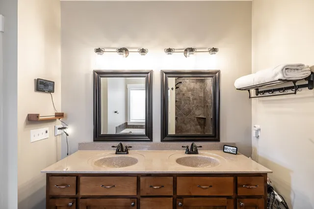 a view of a patio with couches chairs and potted plants