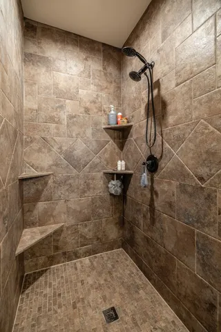 a backyard of a house with lots of green space and fountain