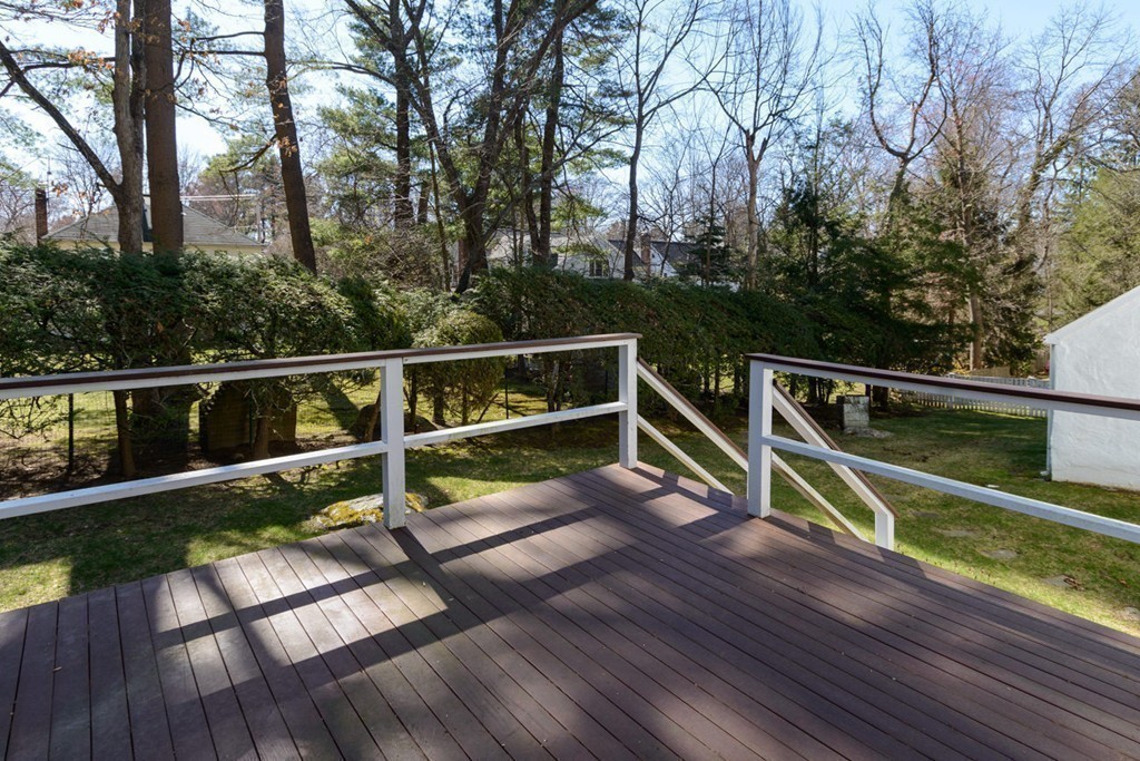 42 Earle Road Wellesley, MA 02481 - Photo 15 of 18 a view of a roof deck with wooden floor and fence