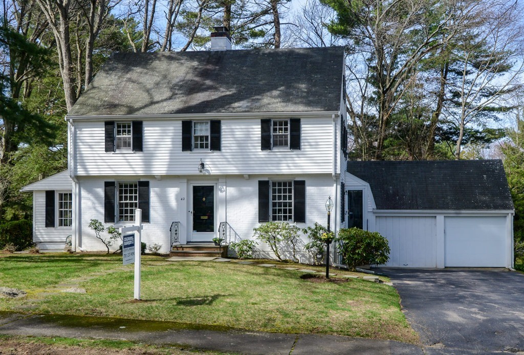42 Earle Road Wellesley, MA 02481 - Photo 2 of 18 a front view of a house with a yard