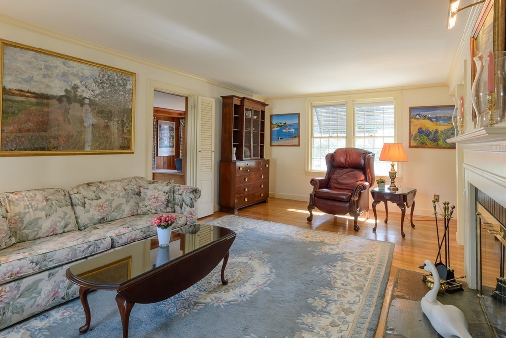 42 Earle Road Wellesley, MA 02481 - Photo 7 of 18 a living room with furniture and a floor to ceiling window