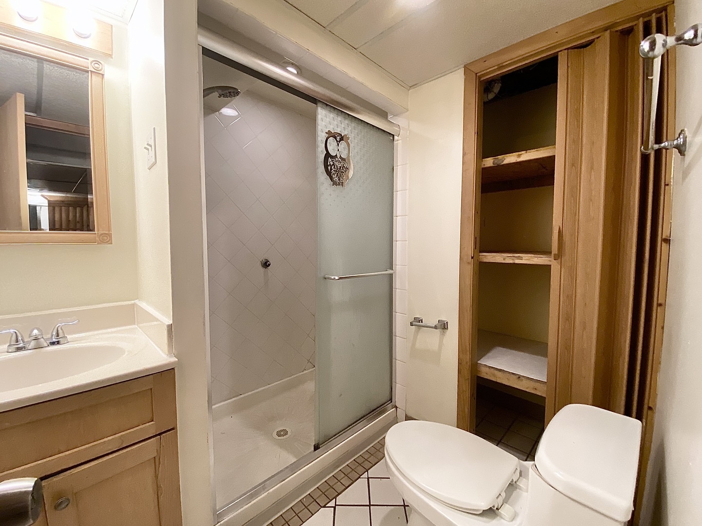 18034 Ridgewood Avenue Lansing, IL 60438 - Photo 28 of 35 a white toilet sitting next to a bathroom sink