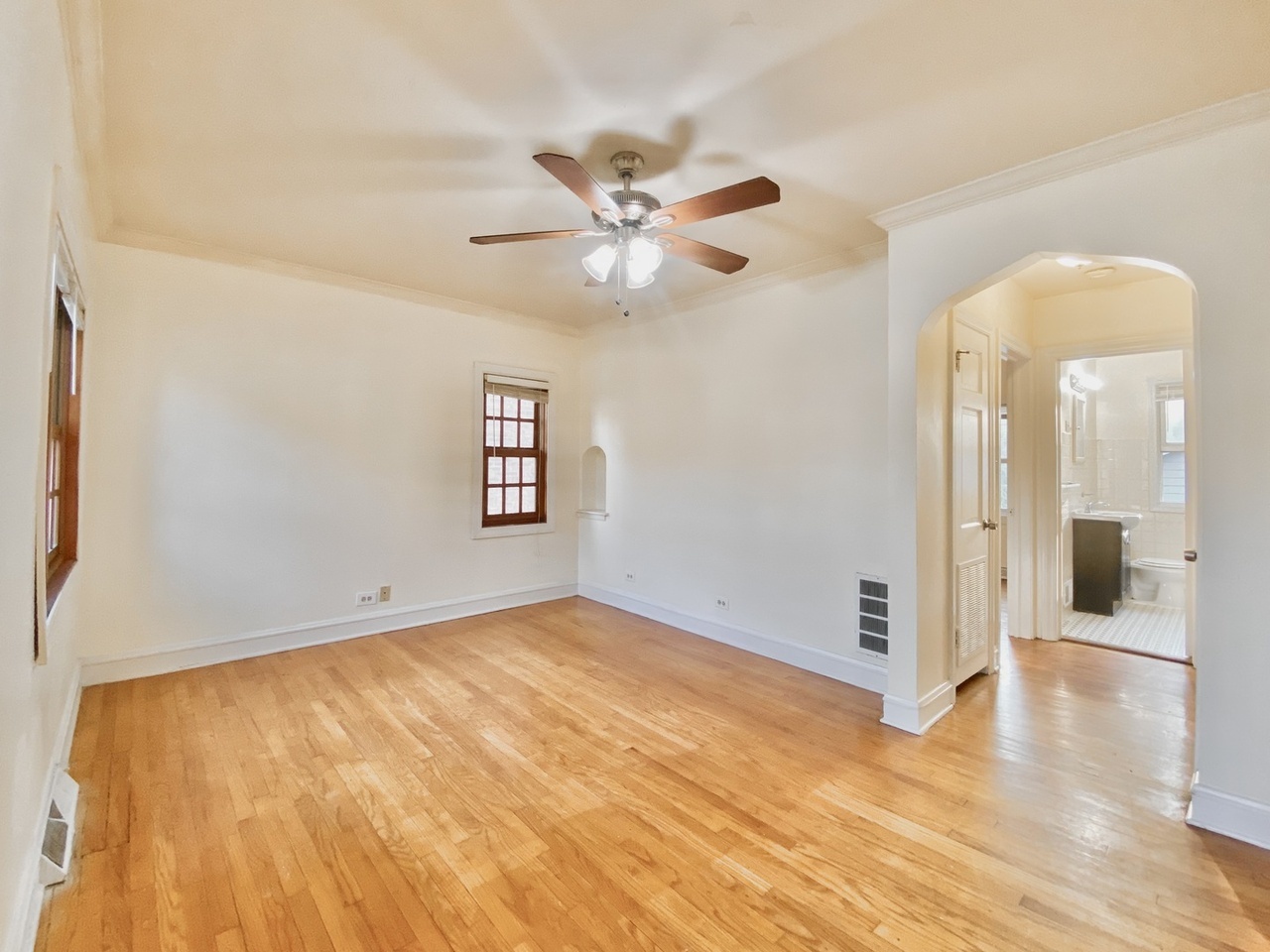 18034 Ridgewood Avenue Lansing, IL 60438 - Photo 4 of 35 wooden floor in an empty room with a window