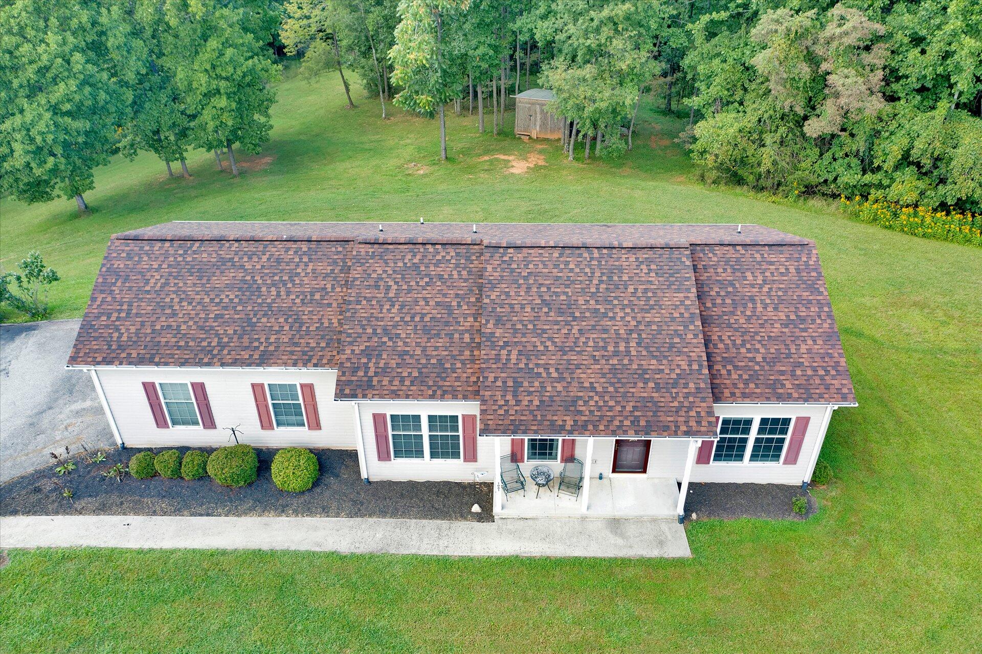 1081 Wooldridge Road Blue Ridge, VA 24064 - Photo 3 of 38 an aerial view of a house with a yard
