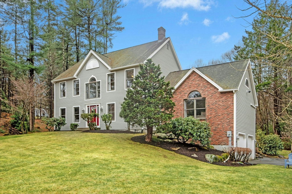 97 Willow Brook Road Holden, MA 01520 - Photo 1 of 42 a view of a house with a yard